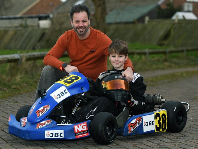 Sam Stoner Racing | Yorkshire Evening Post | Article | Sam sat in the kart, dad sat next to Sam.